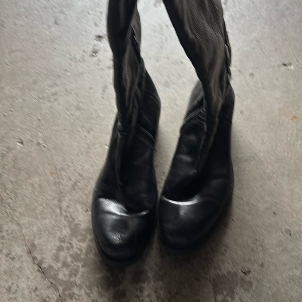 Black leather cowboy boot